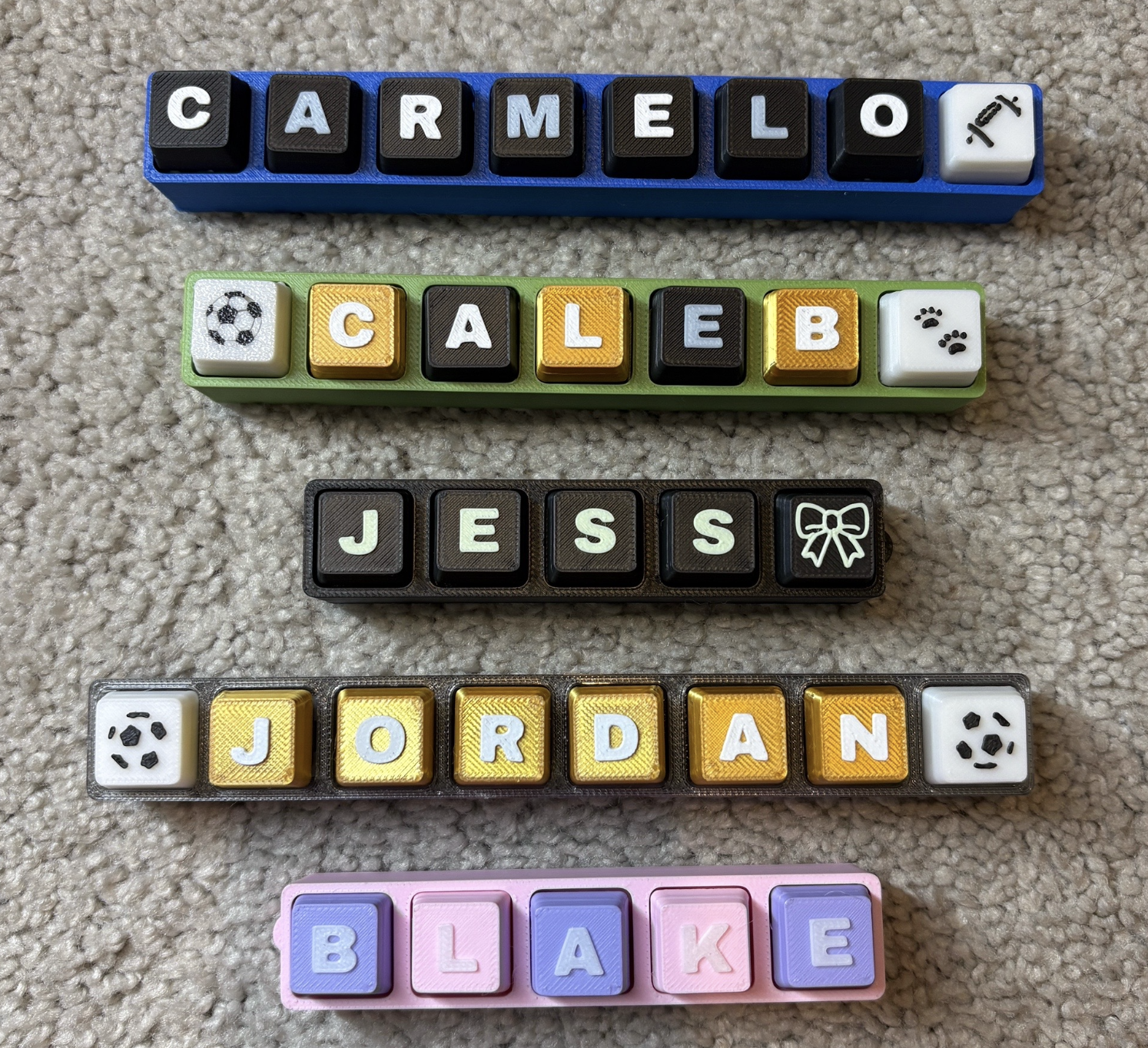 Custom name keycaps including Carmelo, Caleb, Jess, Jordan, and Blake
